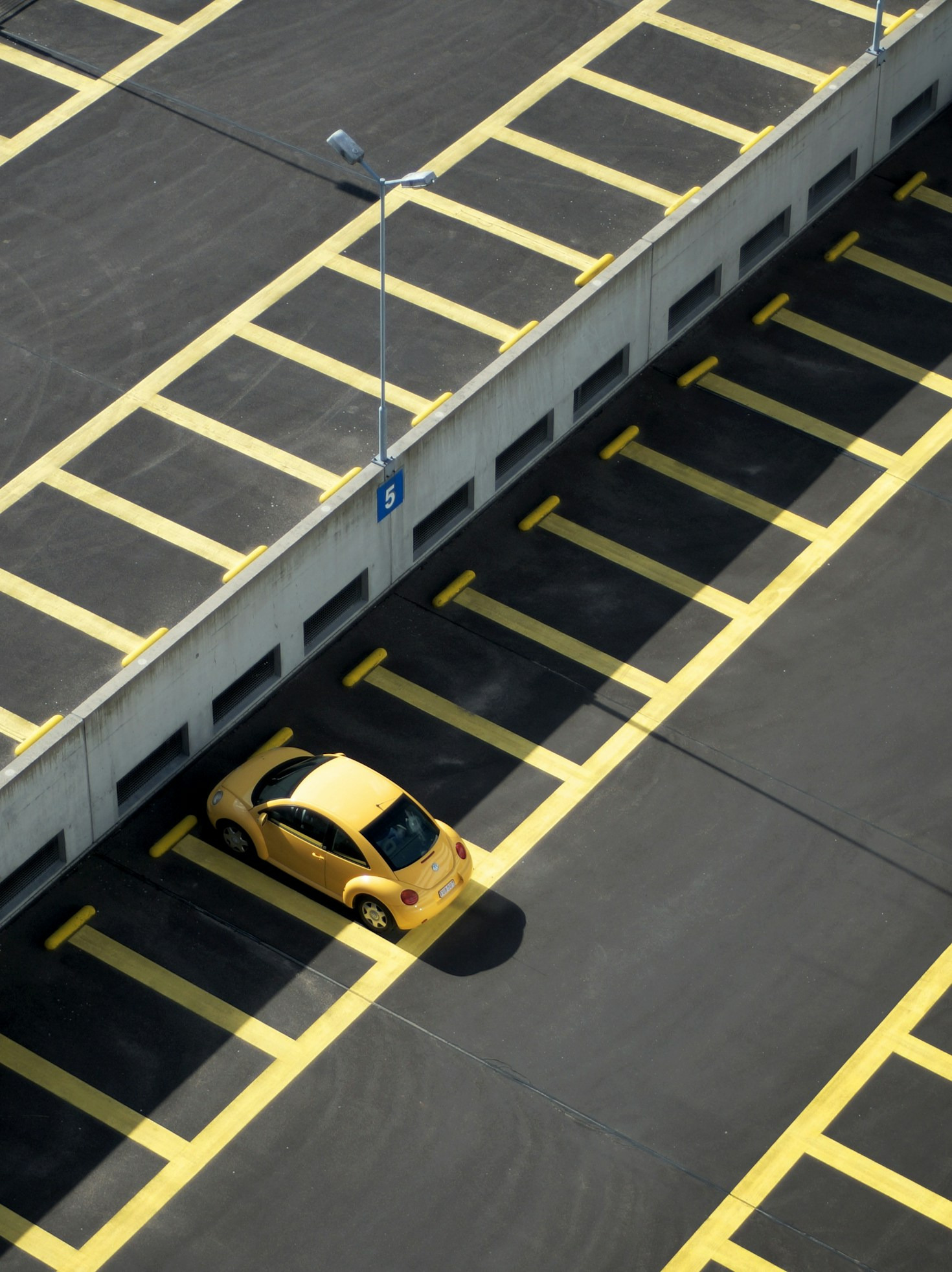 Urban Economics and the Evolution of Parking Spaces